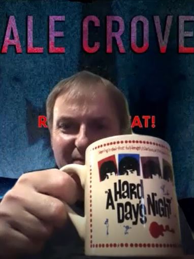 Dale Crover holding a Beatles coffee mug